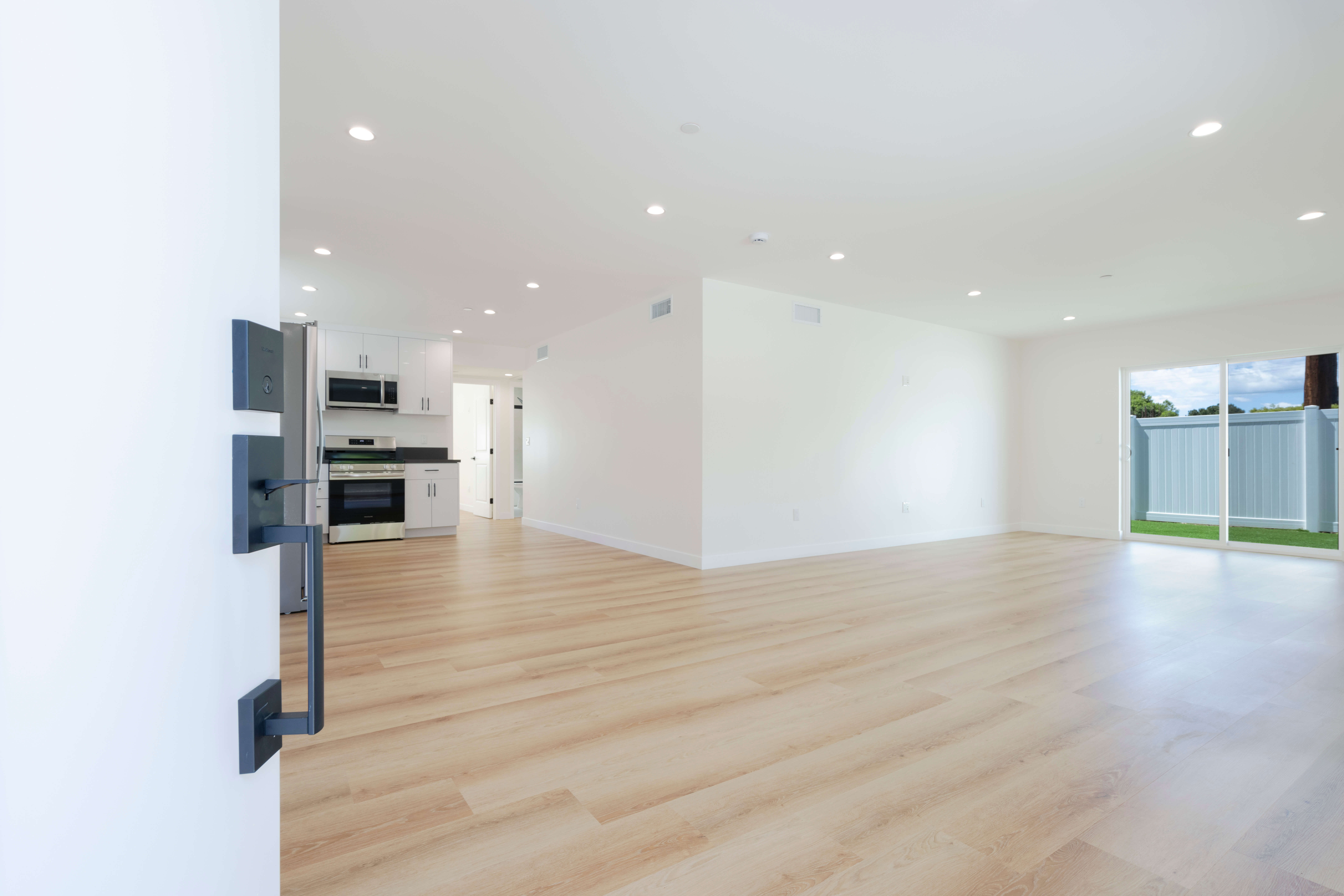 Open floor plan ADU with modern finishes and natural lighting